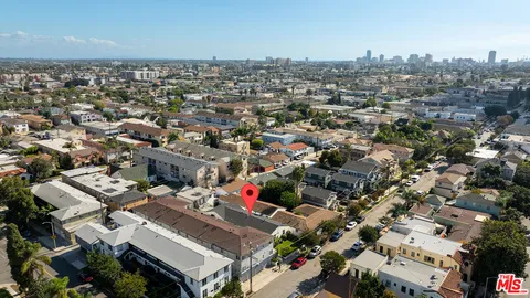an aerial view of a house with outdoor space