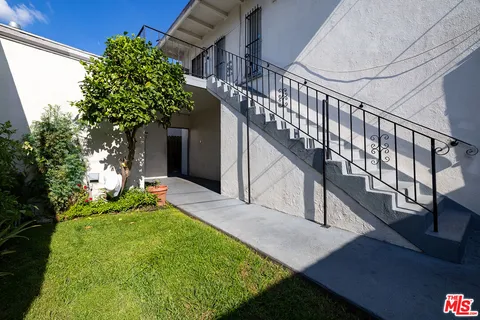 a view of a house with a garage