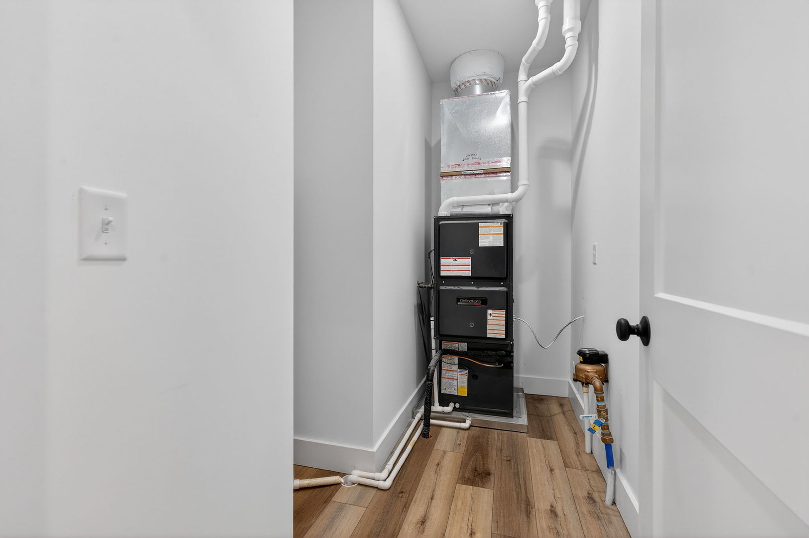 1165 Farmstone Drive Diamond, IL 60416 - Photo 29 of 35 a view of a hallway with wooden floor and staircase