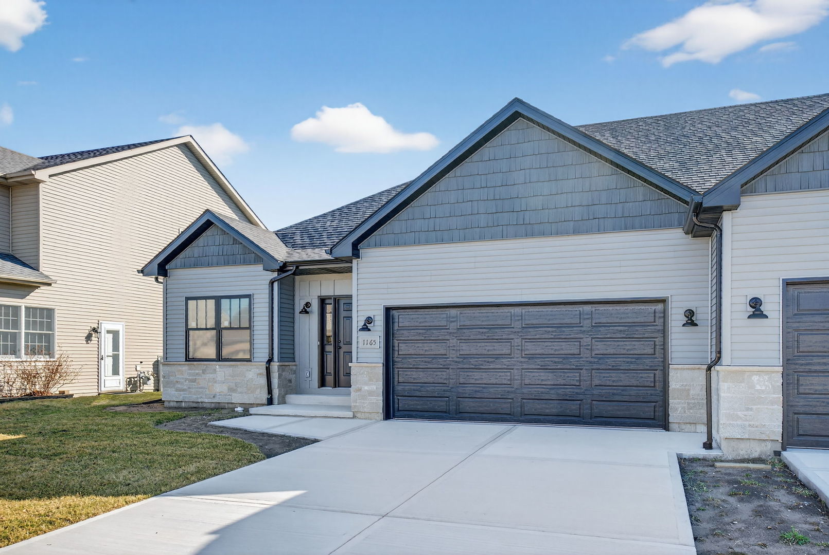 1165 Farmstone Drive Diamond, IL 60416 - Photo 3 of 35 a front view of a house with a yard and garage