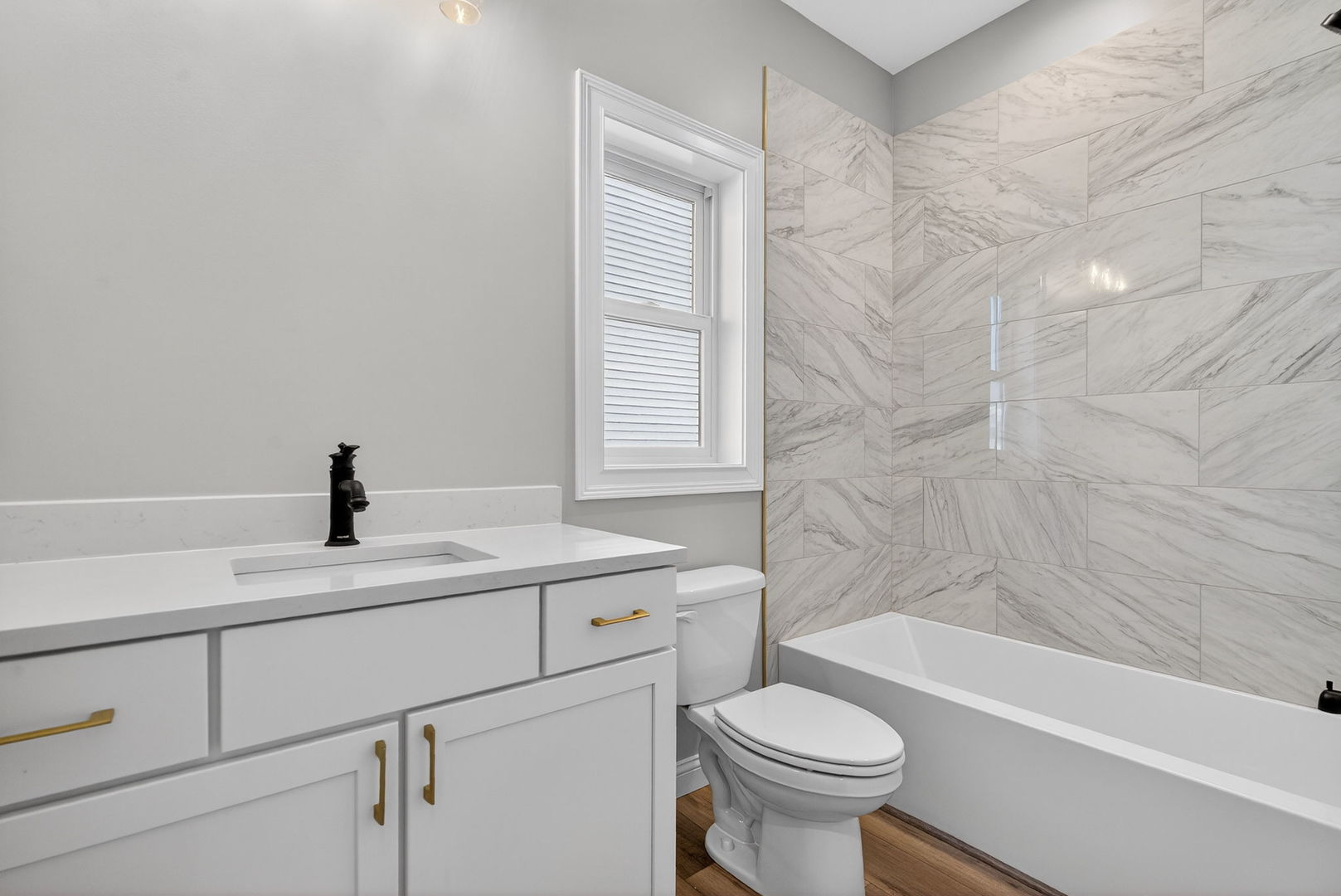 1165 Farmstone Drive Diamond, IL 60416 - Photo 8 of 35 a bathroom with a sink toilet and a bathtub