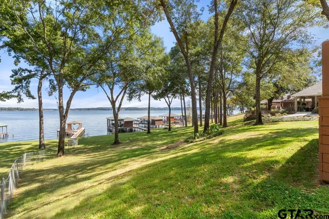 a view of a playground with basketball court