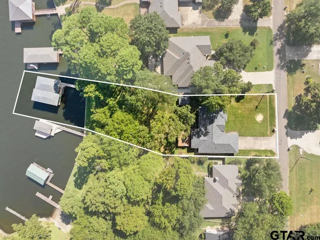 an aerial view of houses and roads