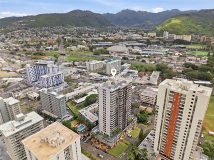 an aerial view of residential houses with outdoor space