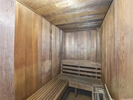 a view of a room with wooden walls