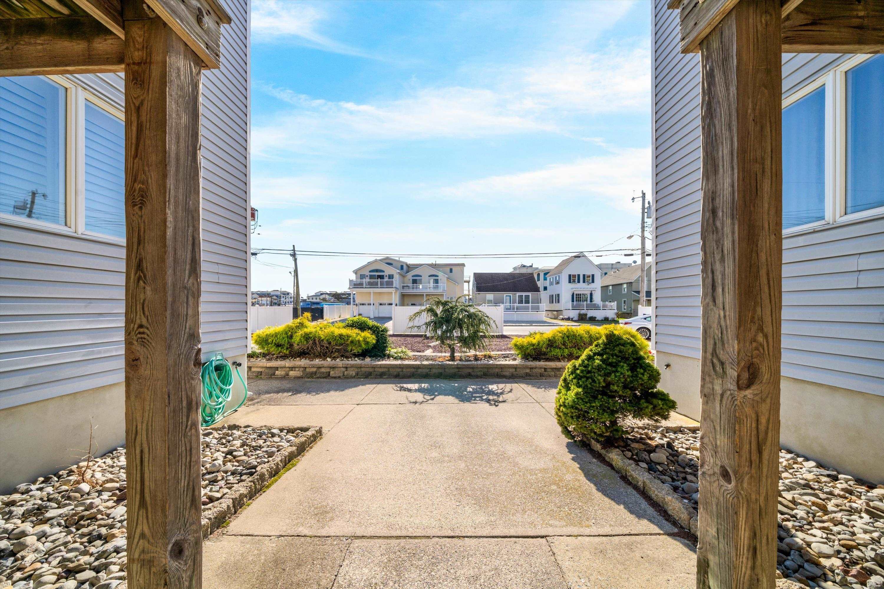 127 40th Street, Unit 1F Sea Isle City, NJ 08243 - Photo 27 of 28 a view of a balcony with sitting area