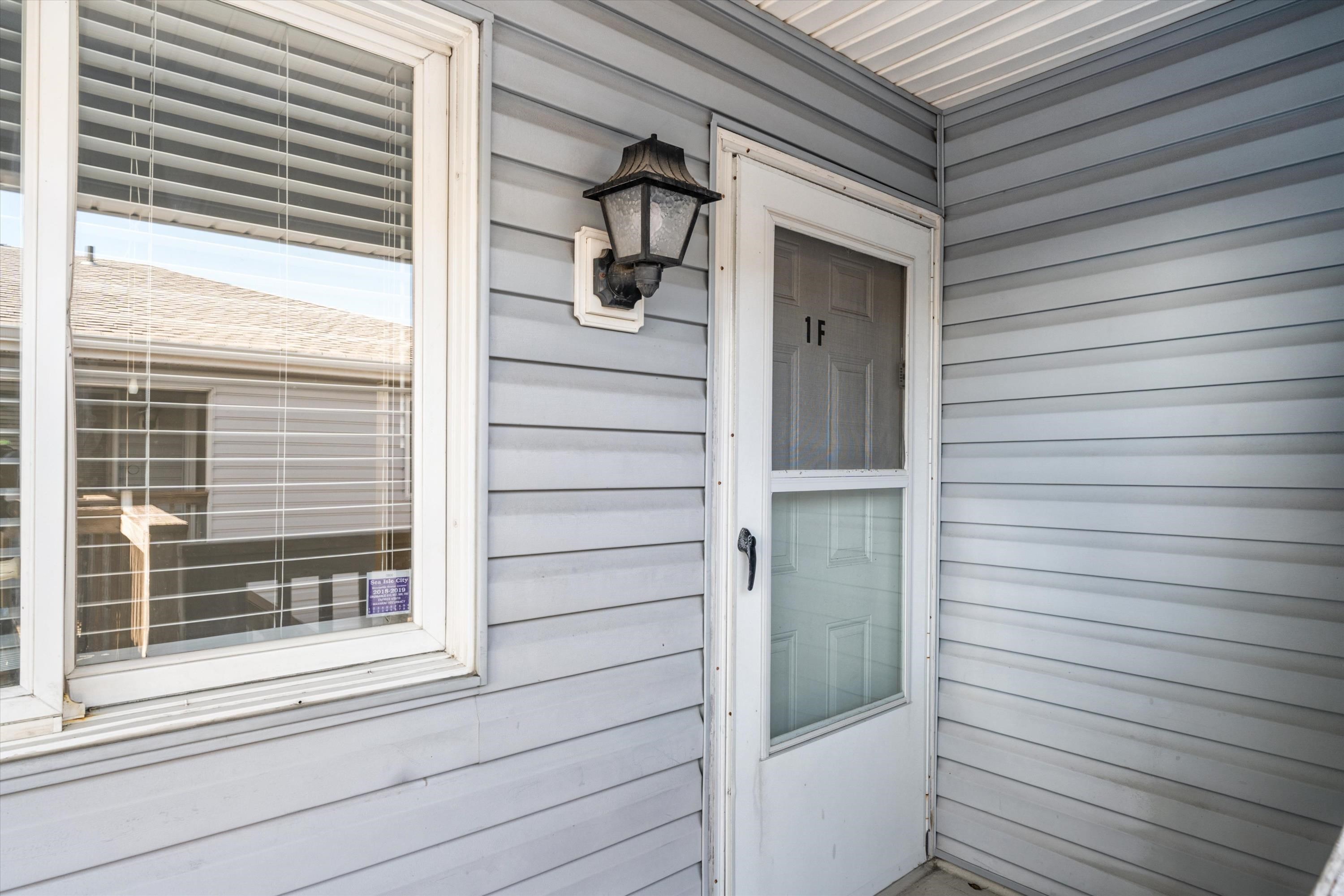 127 40th Street, Unit 1F Sea Isle City, NJ 08243 - Photo 4 of 28 a view of front door