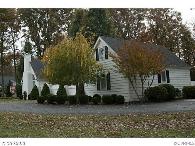 2350 Winterfield Road Midlothian, VA 23113 - Photo 12 of 13 a view of a house with a yard