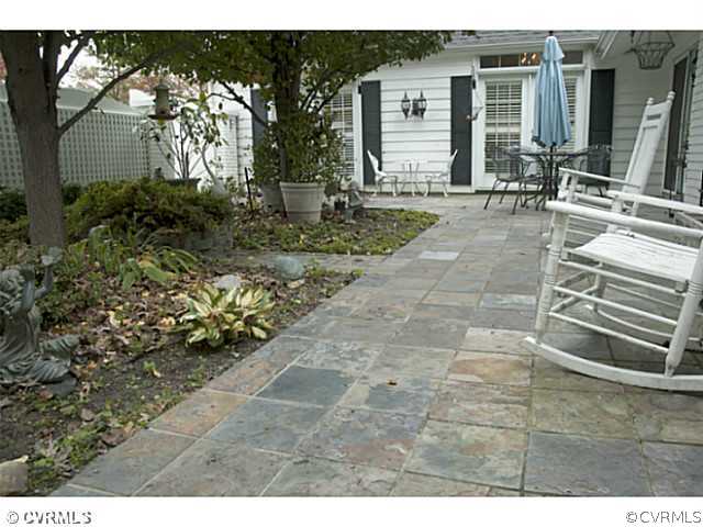 2350 Winterfield Road Midlothian, VA 23113 - Photo 10 of 13 a backyard of a house with yard and outdoor seating