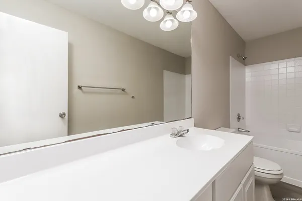 a bathroom with a sink and a toilet
