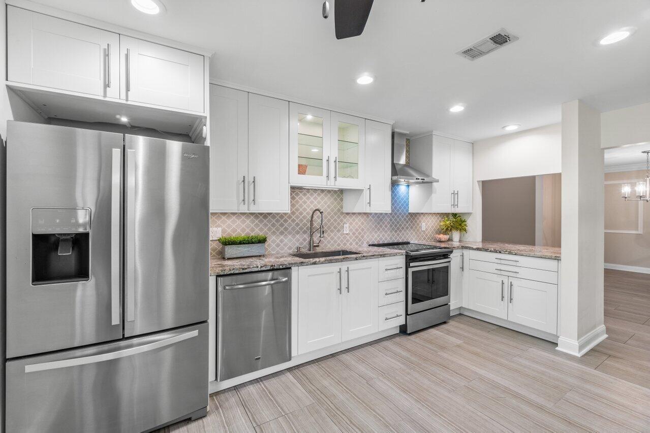 9240 Sabal Ridge Circle, Unit B Boca Raton, FL 33428 - Photo 2 of 22 Inviting, updated kitchen