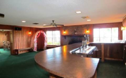 96283 Freeman Road Yulee, FL 32097 - Photo 11 of 17 a view of a living room with kitchen view and a large window