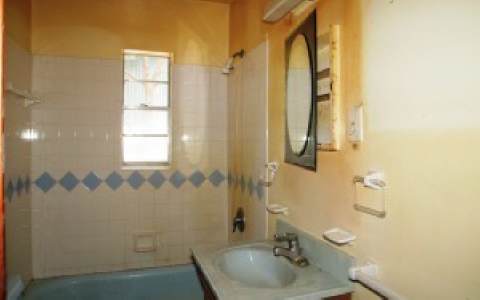 96283 Freeman Road Yulee, FL 32097 - Photo 7 of 17 a bathroom with a sink a toilet and shower
