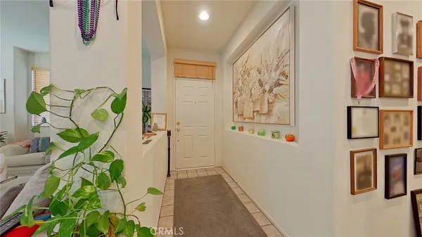 a bathroom with a granite countertop sink a mirror and shower