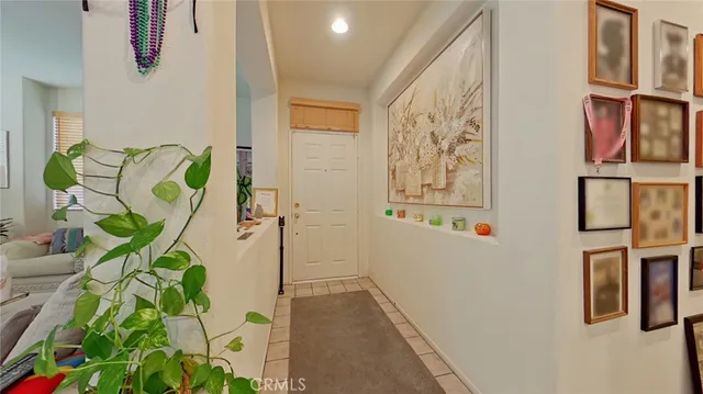 a bathroom with a granite countertop sink a mirror and shower