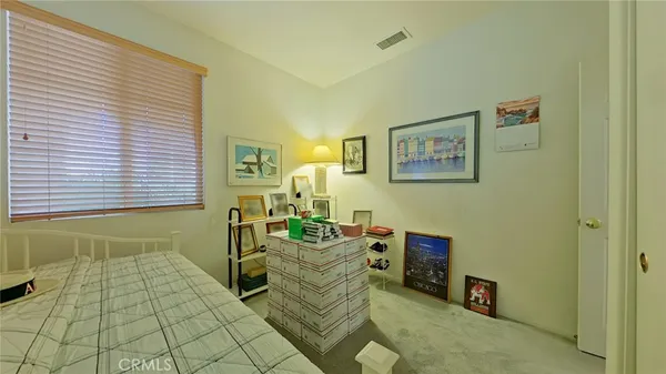 a room with furniture and a window