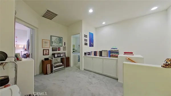 a room with furniture and storage