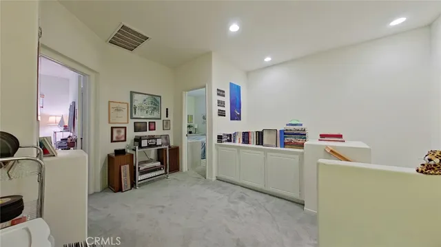 a room with furniture and storage