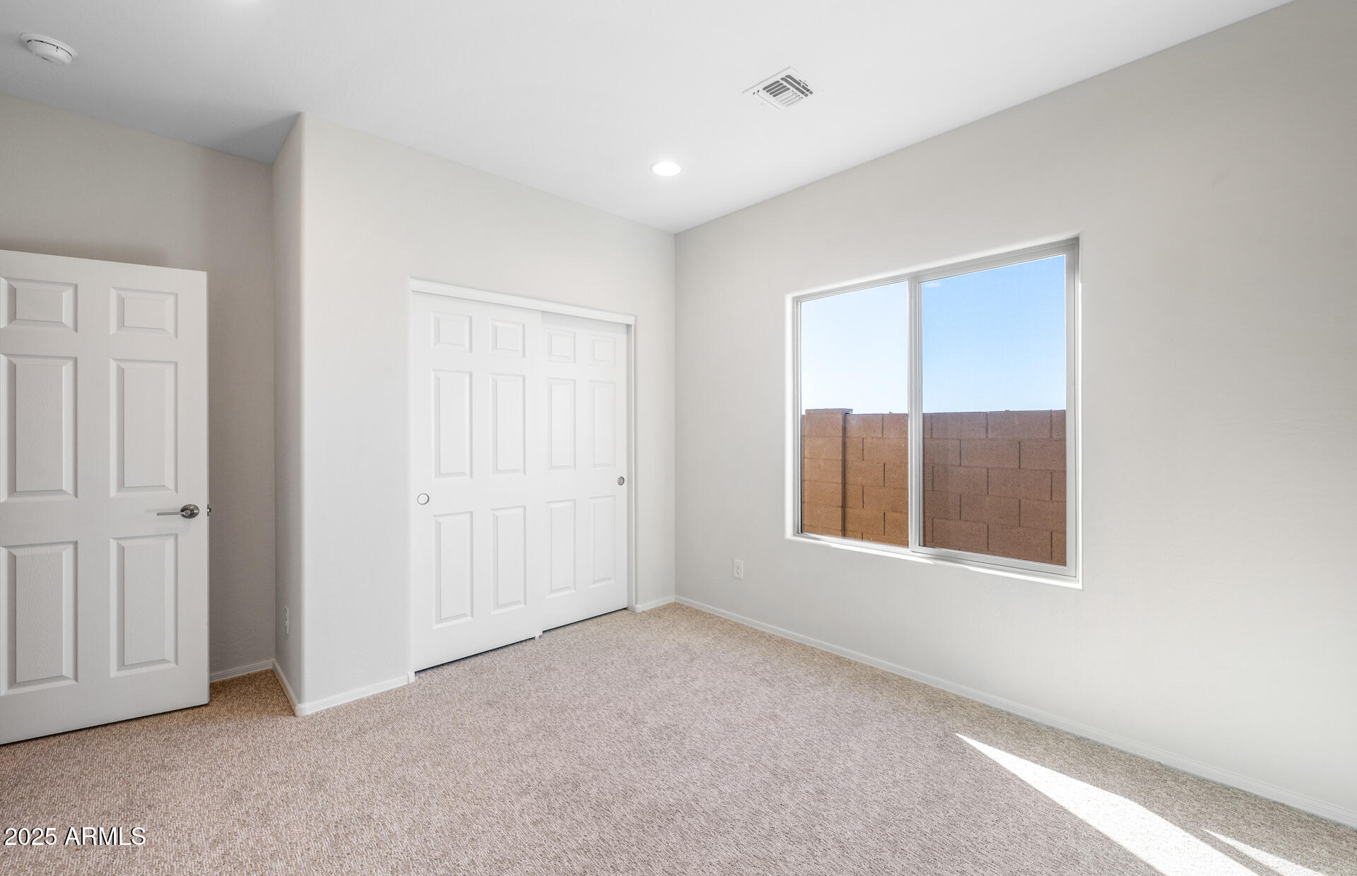 6826 West Ripken Way Florence, AZ 85132 - Photo 14 of 35 an empty room with windows