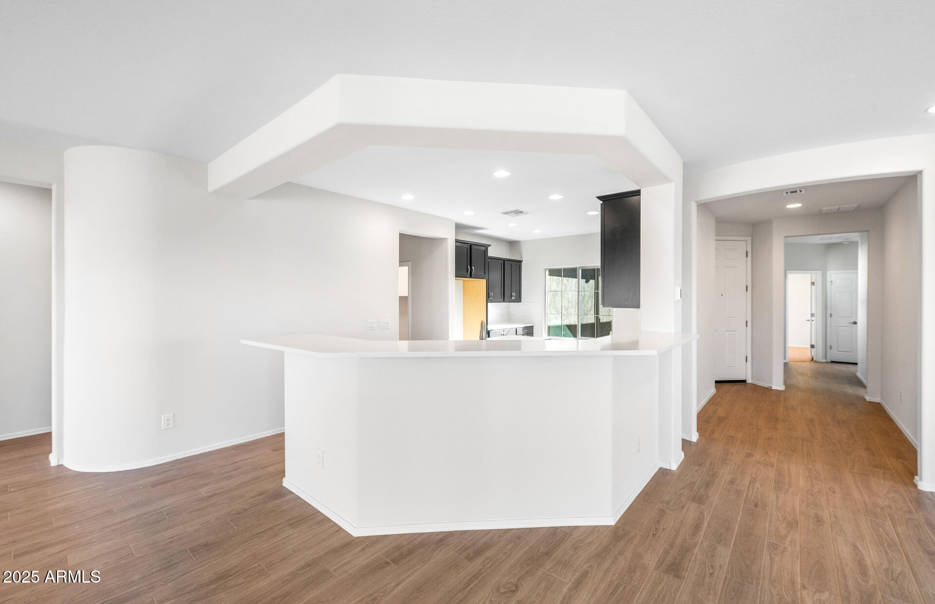 6826 West Ripken Way Florence, AZ 85132 - Photo 20 of 35 a view of kitchen with wooden floor