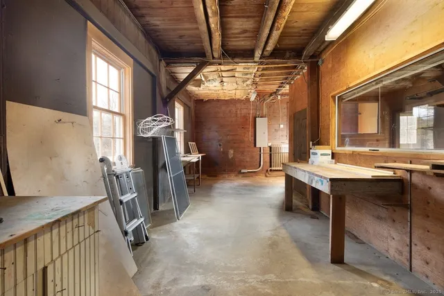 a view of a hallway with workspace