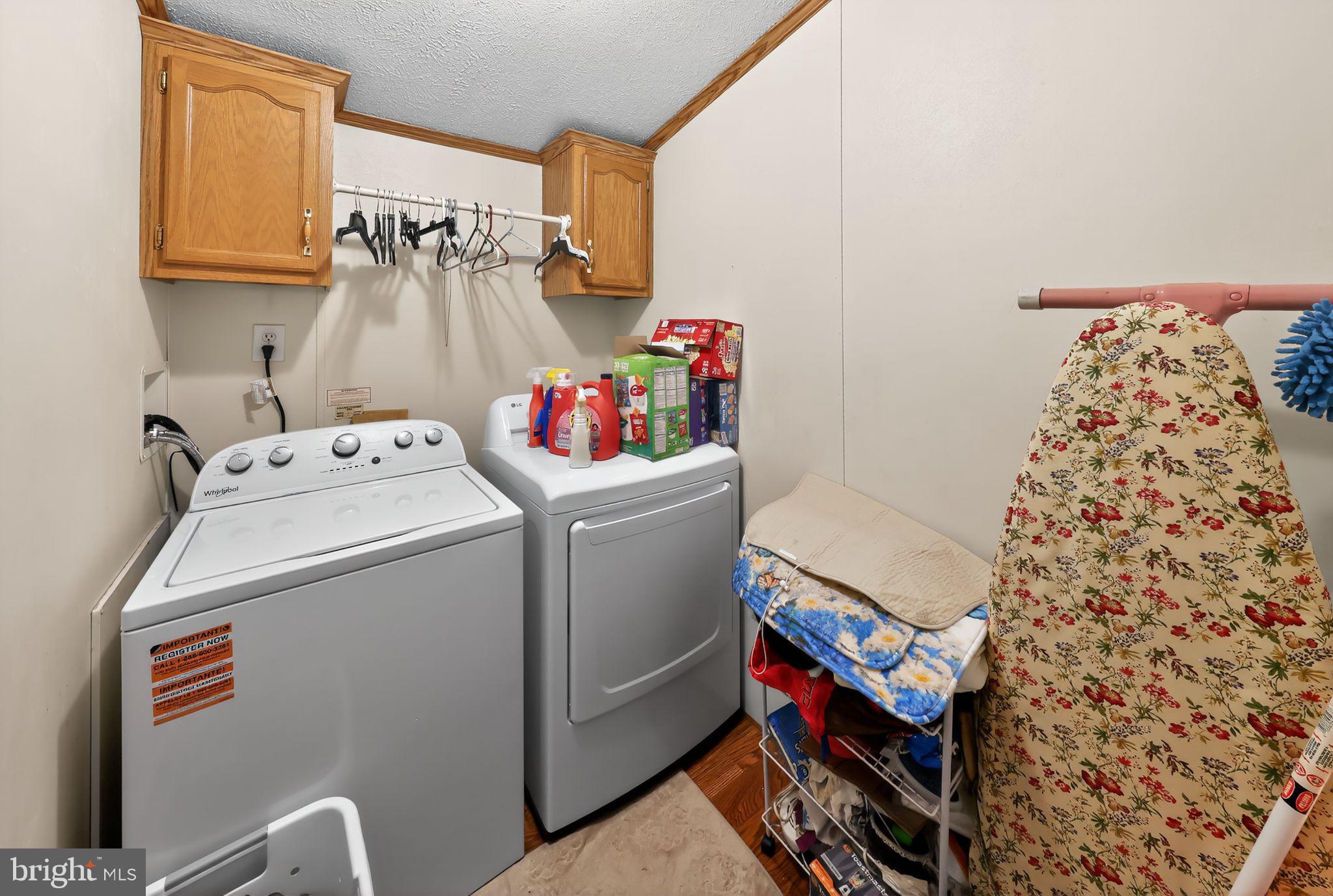 8 Penney Lane Coatesville, PA 19320 - Photo 14 of 14 a utility room with dryer and washer