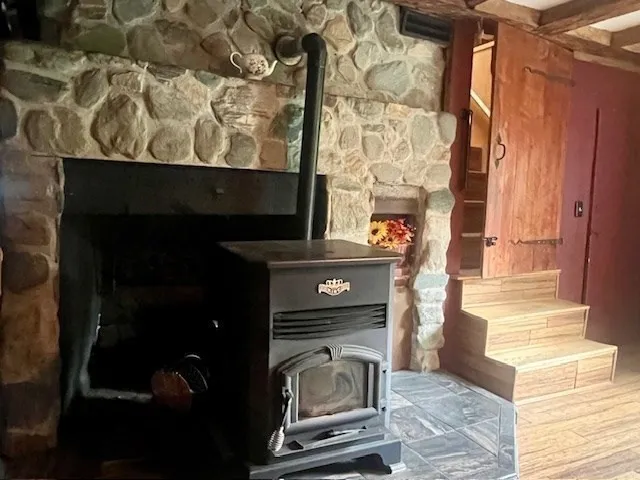a kitchen with stainless steel appliances granite countertop a stove and a refrigerator