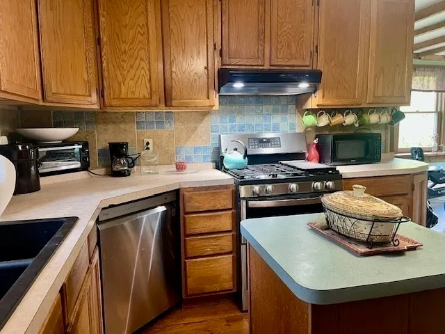 a bathroom with a toilet and a sink