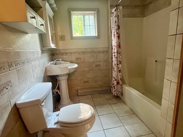 a view of outdoor space with wooden floor and window