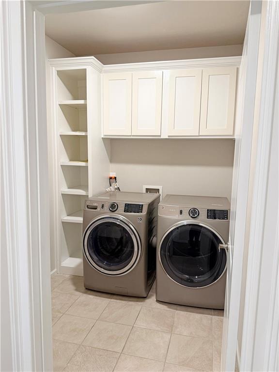 5296 Cheval Rue Court Suwanee, GA 30024 - Photo 15 of 51 a utility room with dryer and washer