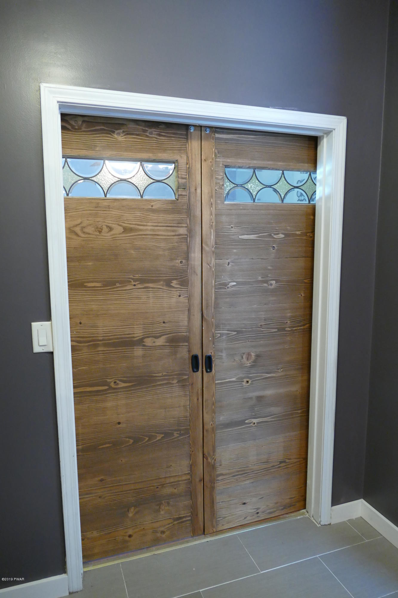 108 Savitz Road Moscow, PA 18444 - Photo 38 of 46 a bathroom with a glass shower door