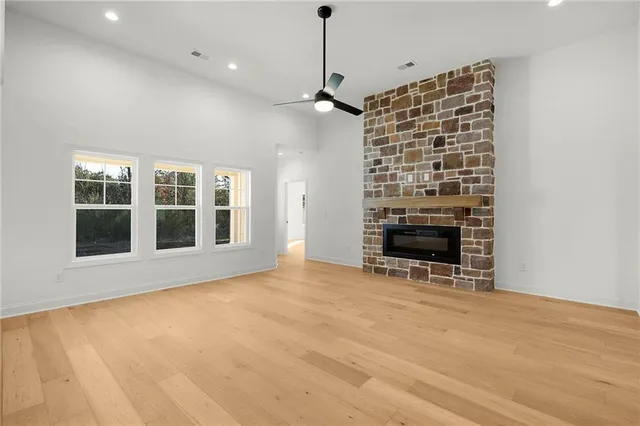 a kitchen with a sink center island and stainless steel appliances