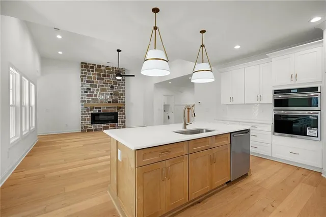 a white bath tub sitting in a bathroom