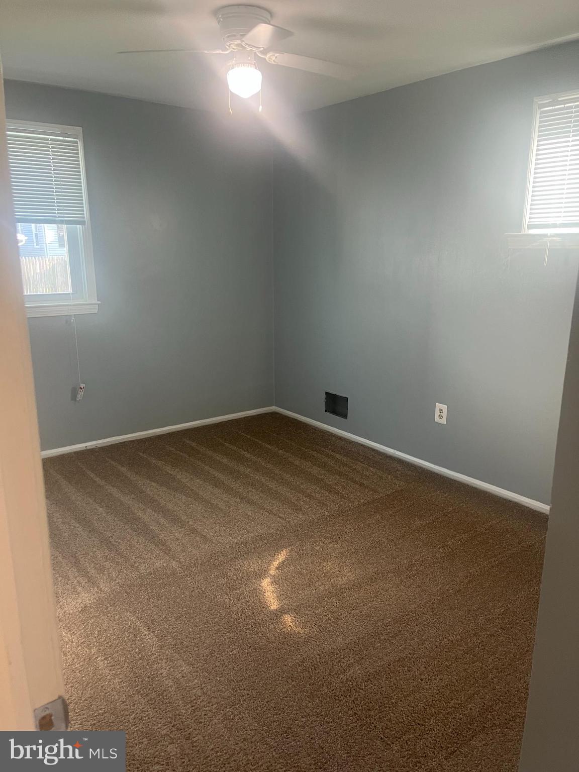 908 Homberg Avenue Baltimore, MD 21221 - Photo 12 of 31 an empty room with windows