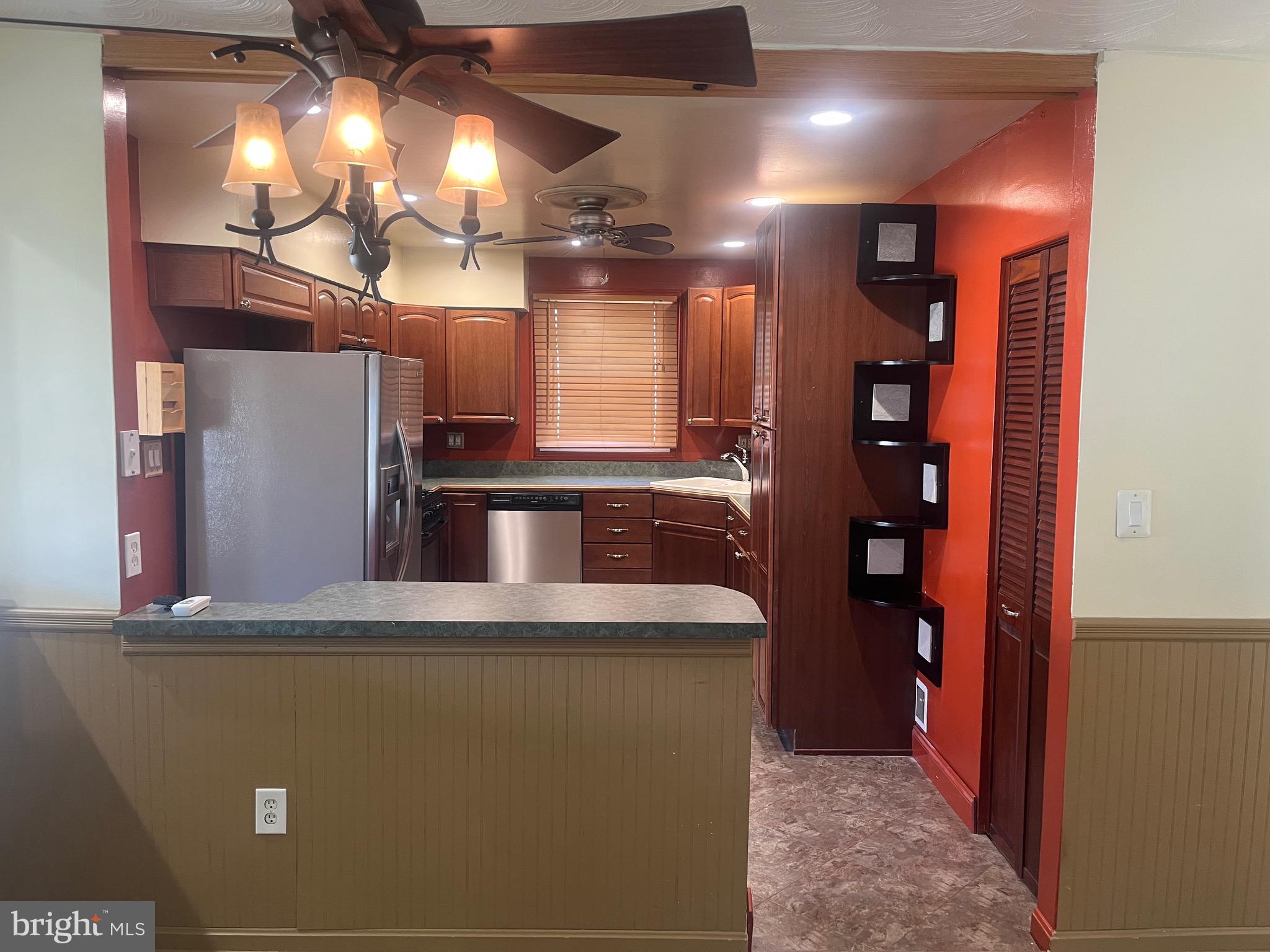 908 Homberg Avenue Baltimore, MD 21221 - Photo 23 of 31 a view of a refrigerator in a room