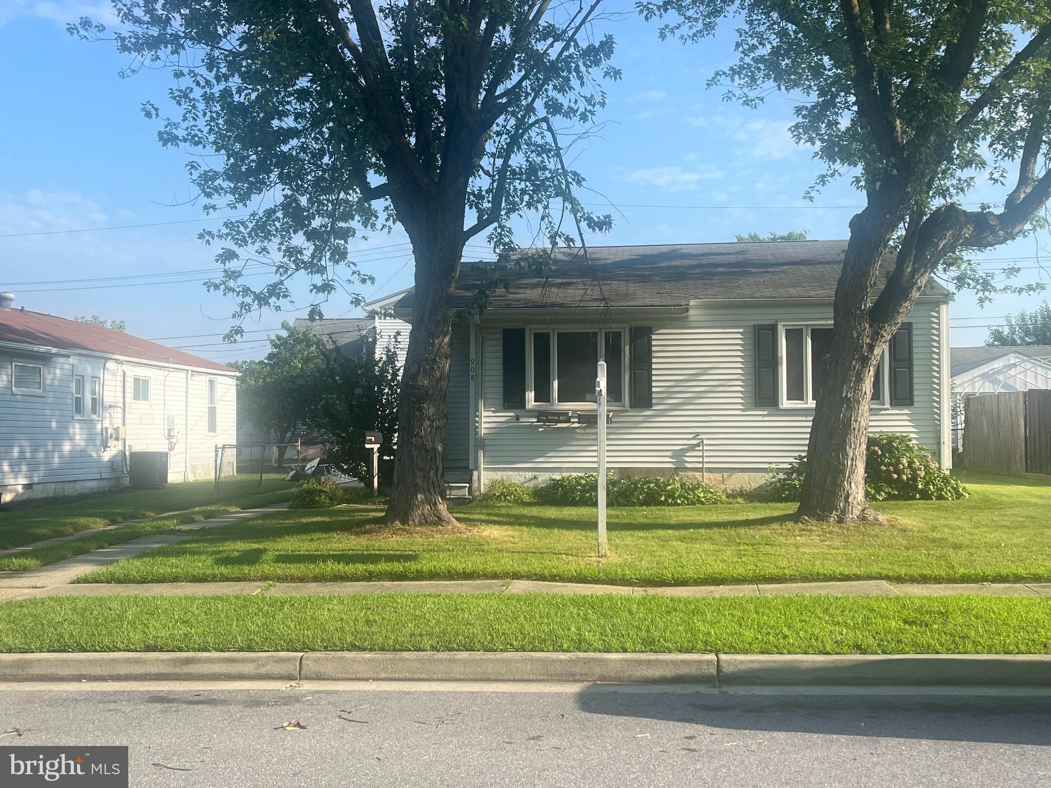 908 Homberg Avenue Baltimore, MD 21221 - Photo 3 of 31 a view of a house with a backyard