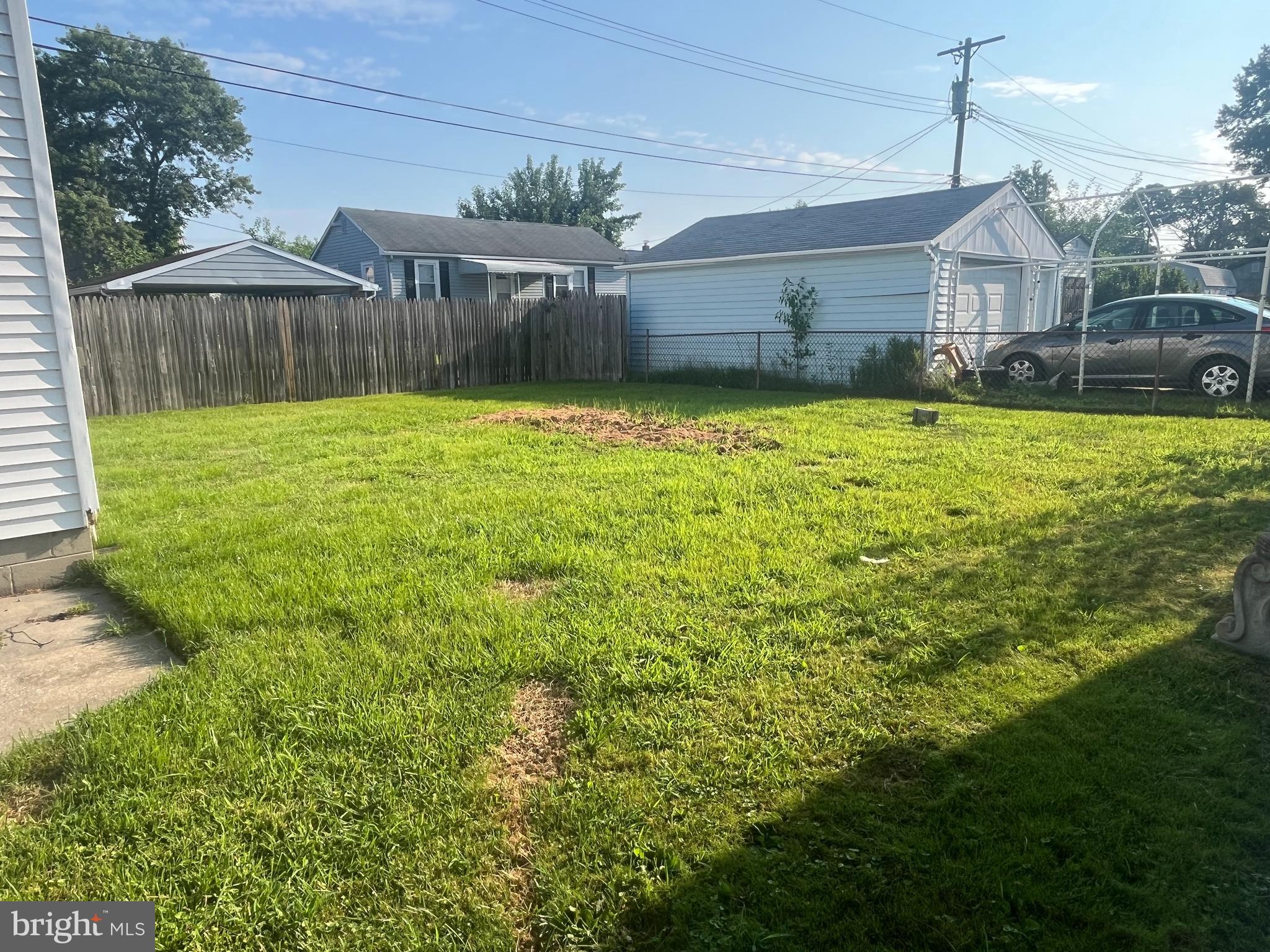 908 Homberg Avenue Baltimore, MD 21221 - Photo 7 of 31 a view of a house with a yard