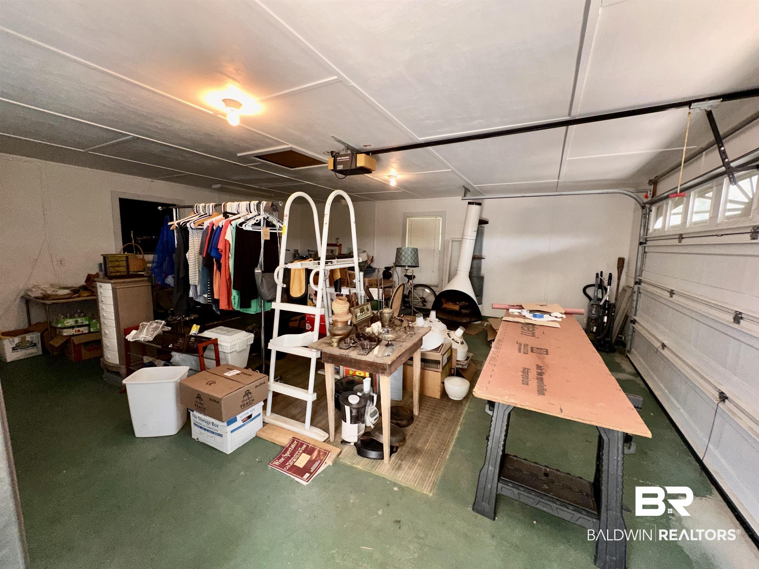 9101 Coronada Road Elberta, AL 36530 - Photo 18 of 27 Garage featuring a garage door opener