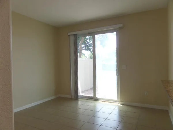 a view of an empty room and window