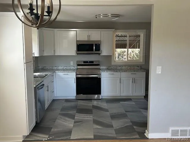 $465,000 | 8681 Hopkins Drive, Denver, CO 80229