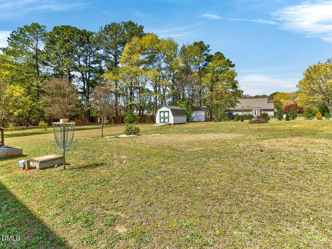 6104 Wolverhampton Drive Raleigh, NC 27603 - Photo 26 of 35 a view of a field with an trees