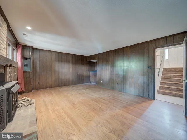 a view of livingroom with an empty space and a window