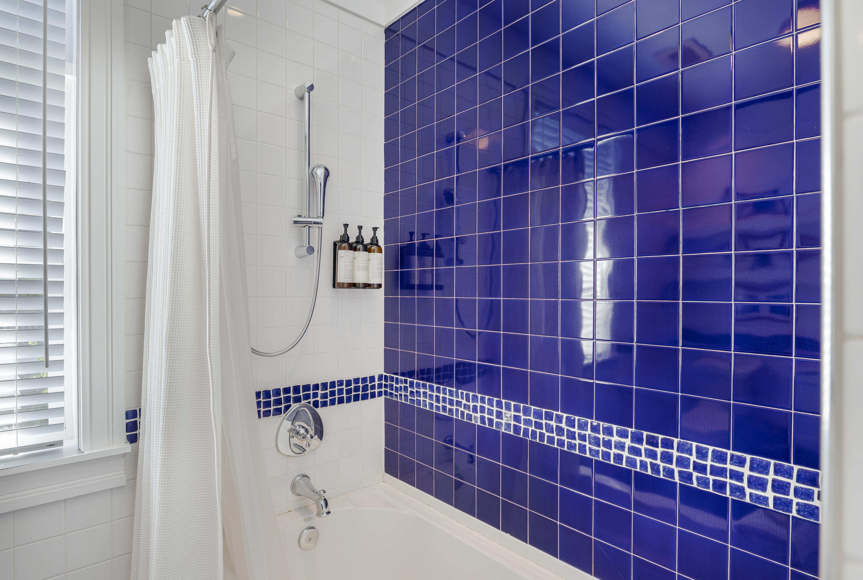 8119 Inspiration Drive, Unit B2 Miramar Beach, FL 32550 - Photo 29 of 44 a bathroom with a shower