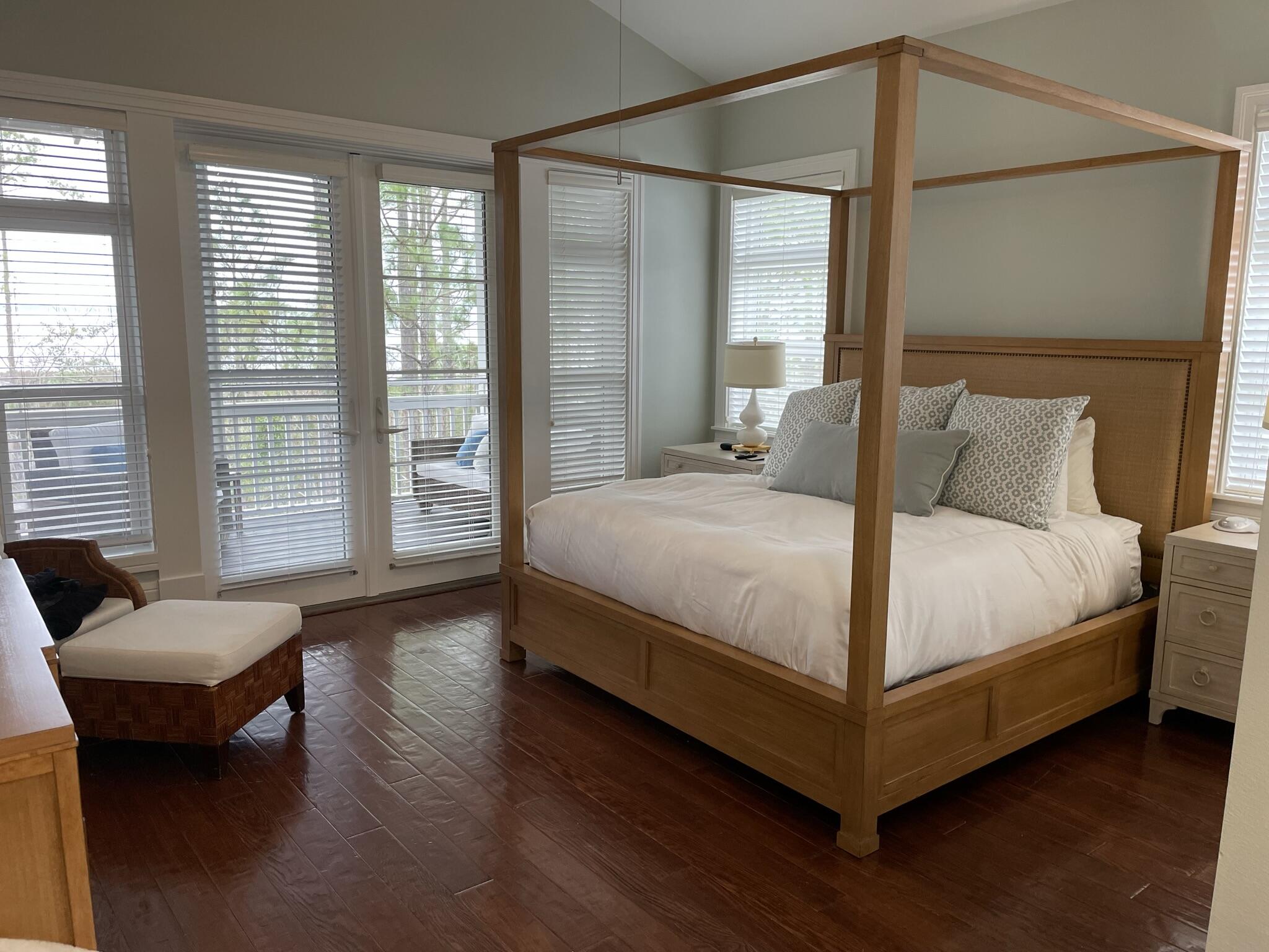 8119 Inspiration Drive, Unit B2 Miramar Beach, FL 32550 - Photo 34 of 44 a bedroom with a bed and a couch next to a window