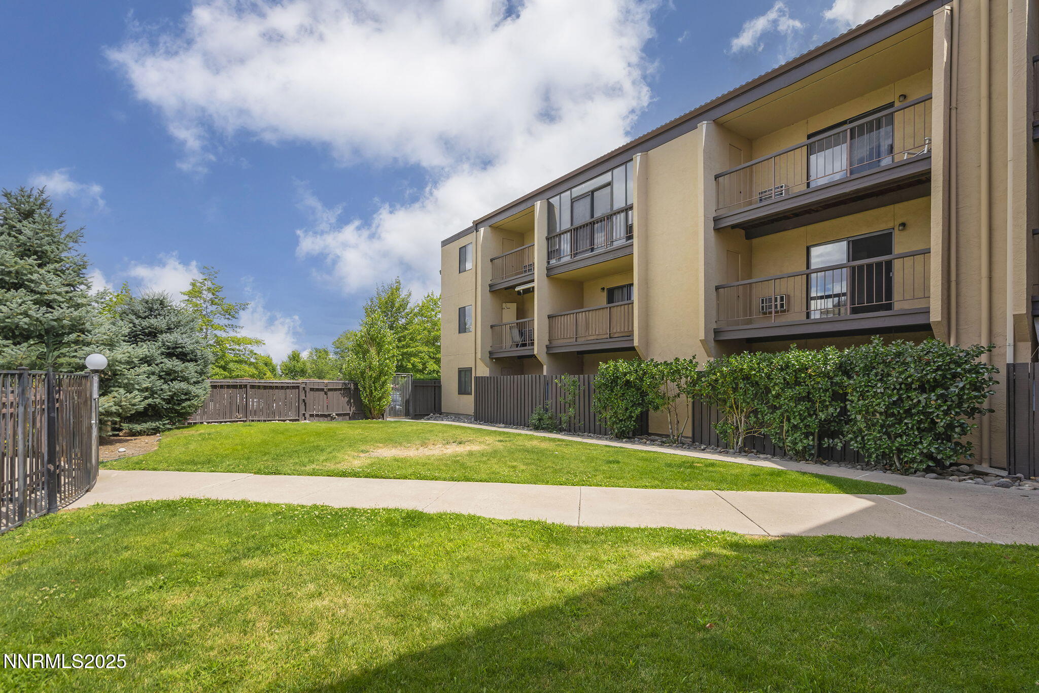2450 Lymbery Street, Unit 105 Reno, NV 89509 - Photo 16 of 21 a view of a house with a yard and plants