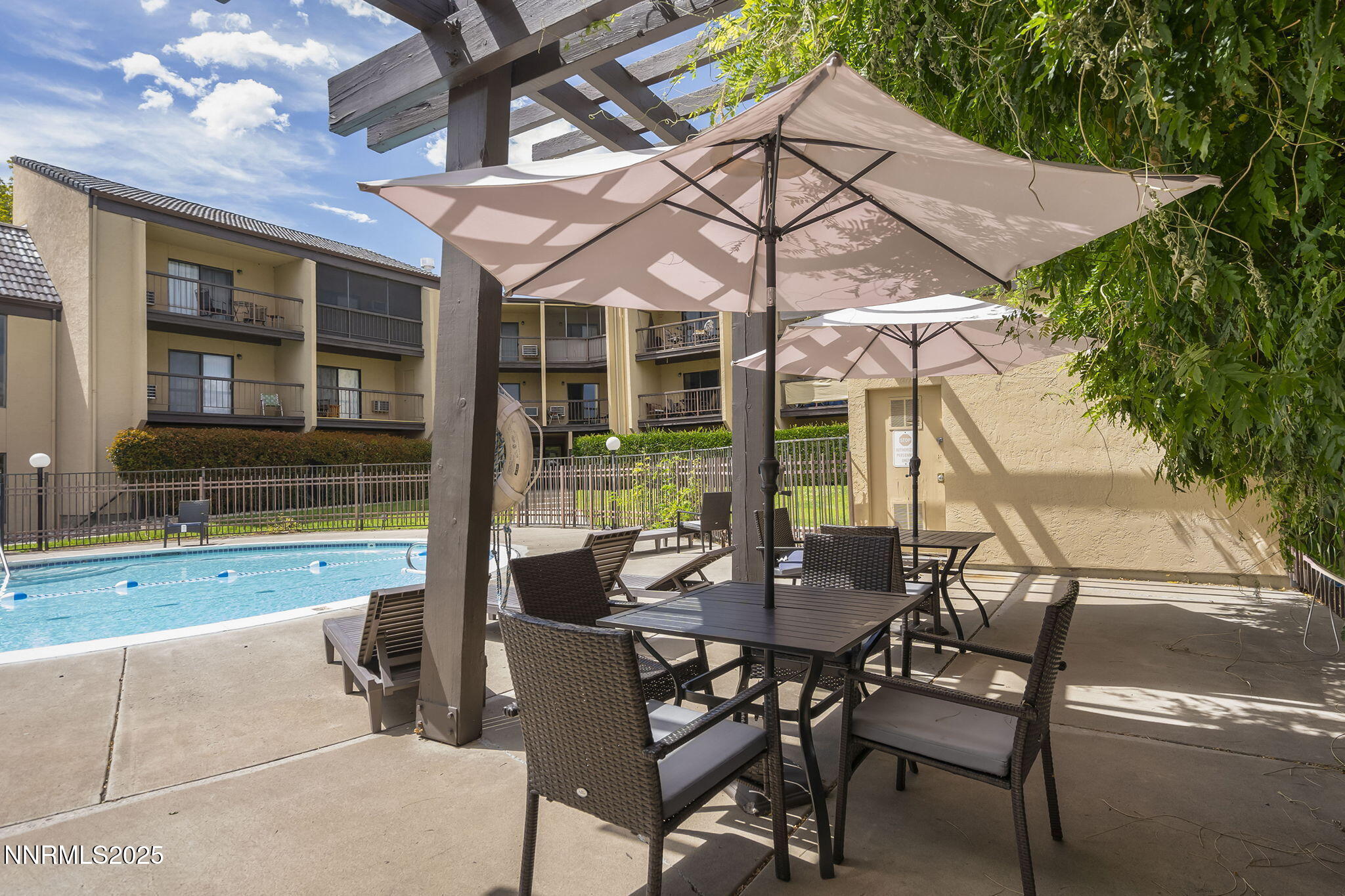 2450 Lymbery Street, Unit 105 Reno, NV 89509 - Photo 20 of 21 a view of a house with backyard and sitting area