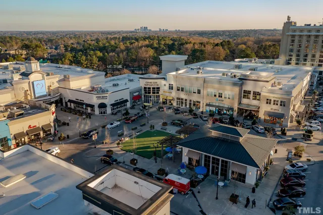 a view of a building with a yard