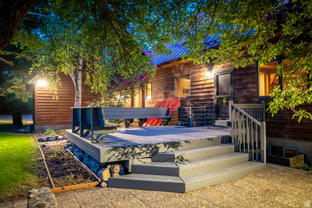 435 Canyon Road Millville, UT 84326 - Photo 103 of 113 Spacious outdoor deck with tiered stairs and wood-finish railing