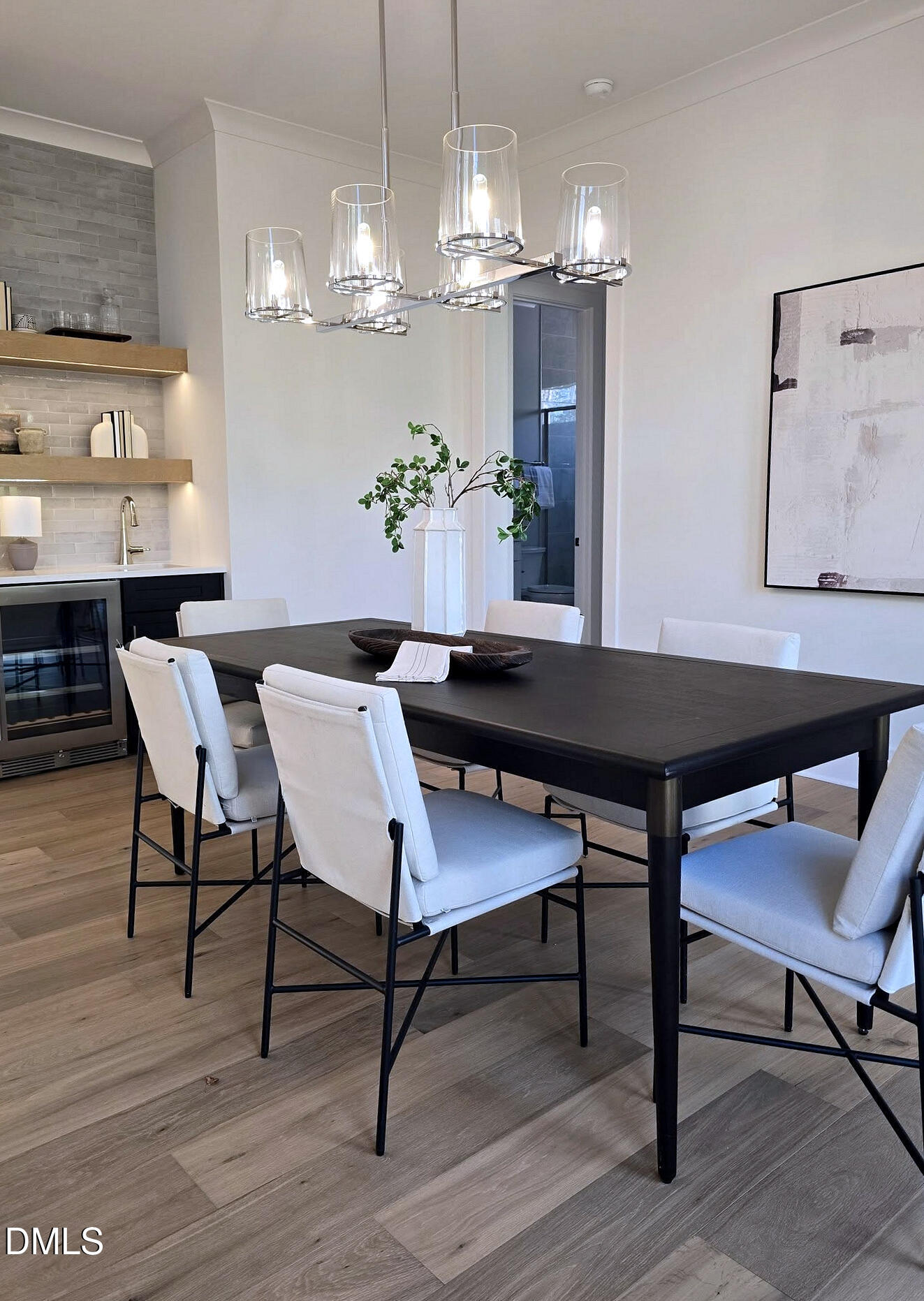 3340 Colby Chase Drive Apex, NC 27539 - Photo 13 of 59 a view of a dining room with furniture and chandelier