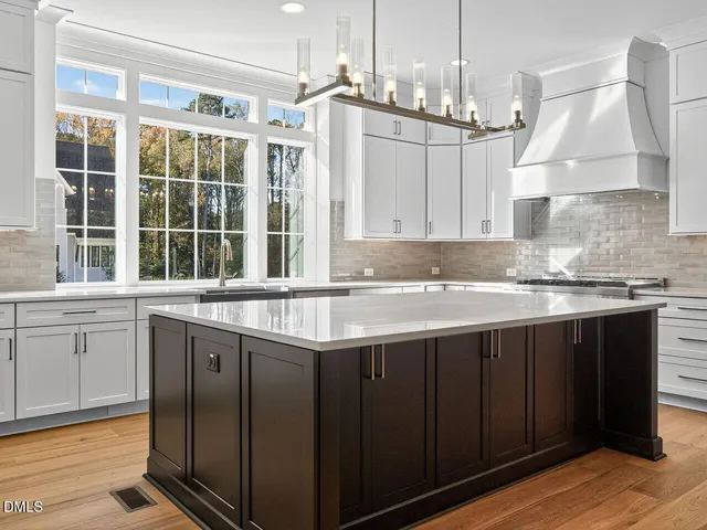 a bathroom with a shower and a sink